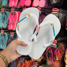 Havaianas Top +  Placa Logo + Pin Sol e Água de Coco